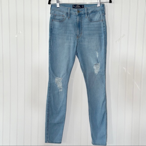 ULTRA HIGH-RISE RIPPED LIGHT WASH SUPER SKINNY JEANS. Item# 0046 - Picture 3 of 7